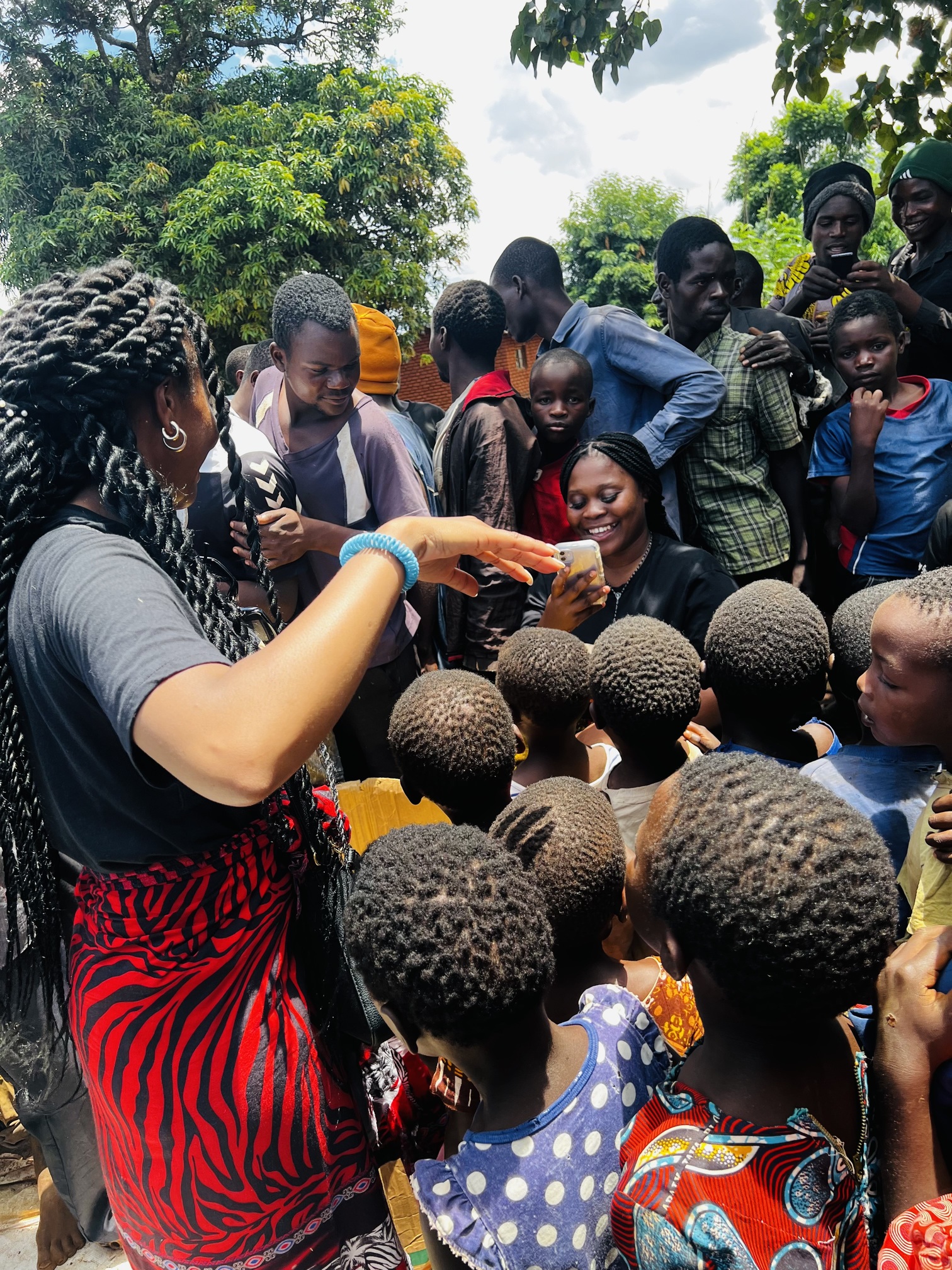 Sharing printed photos with the village